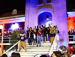Photo from homecoming with Wilbur and Wilma Wildcat. Link to Gifts of Real Estate. 