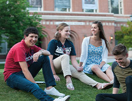Photo of a group of students sitting together. Links to Beneficiary Designations