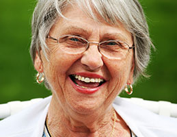 Photo of a woman smiling.